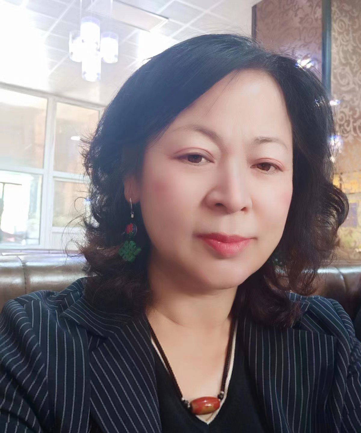 新疆辦事處—胡秀萍